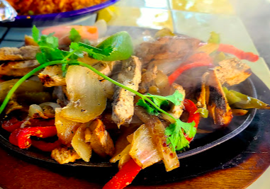 El Encanto signature dishes Carne Asada Tacos
Shrimp Tacos
Fajitas